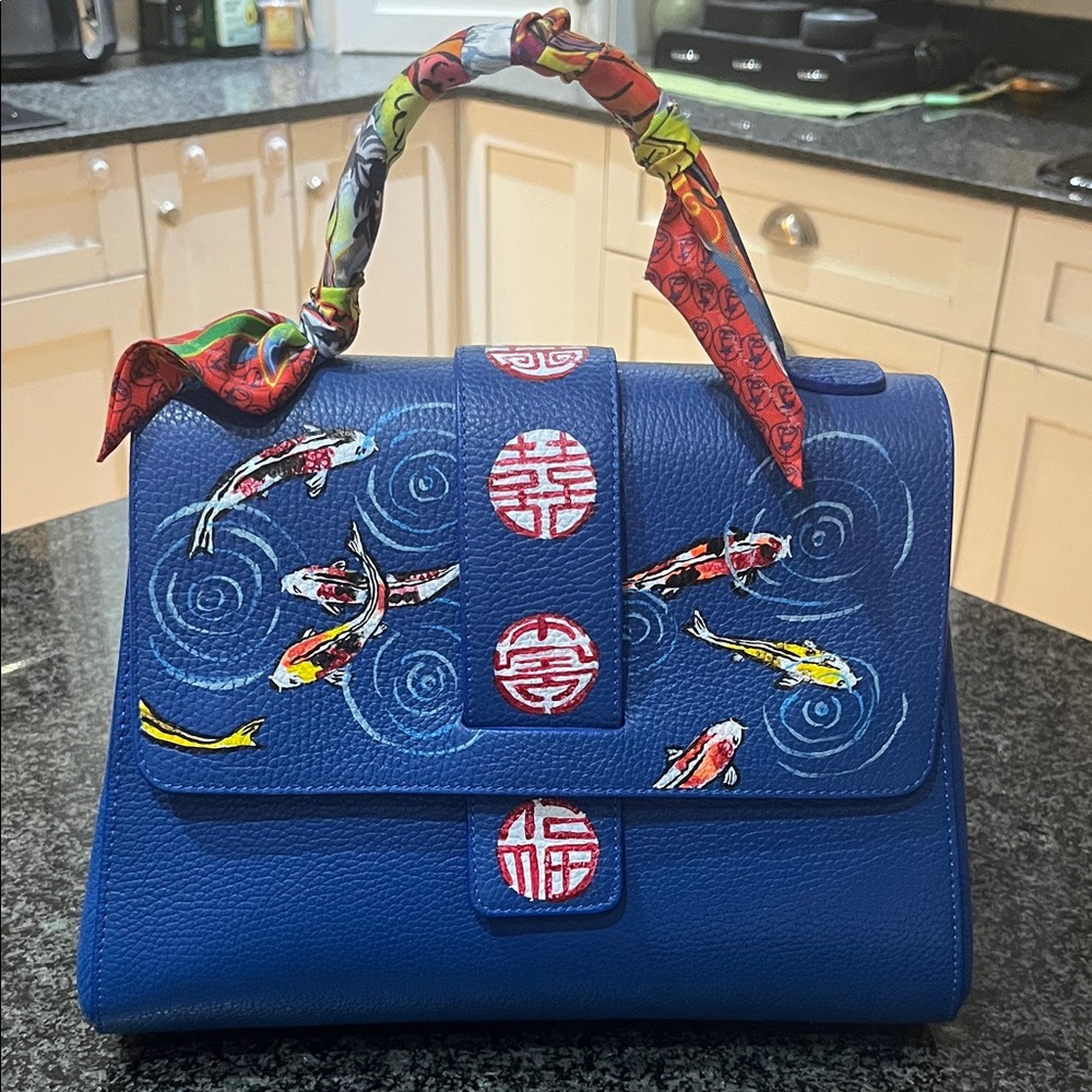 Blue Designer Handbag with Colorful Fish Design